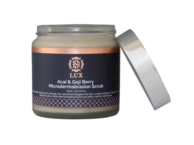 Exfoliating Microdermabrasion Face Mask with Acai & Goji Berry Extract. Presented in an open glass jar with silver lid.