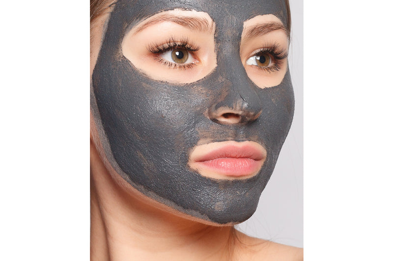 Lady wearing Dead Sea Mud Clay Facemask 