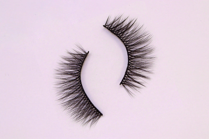 Natural False Eyelashes on Pink Background 