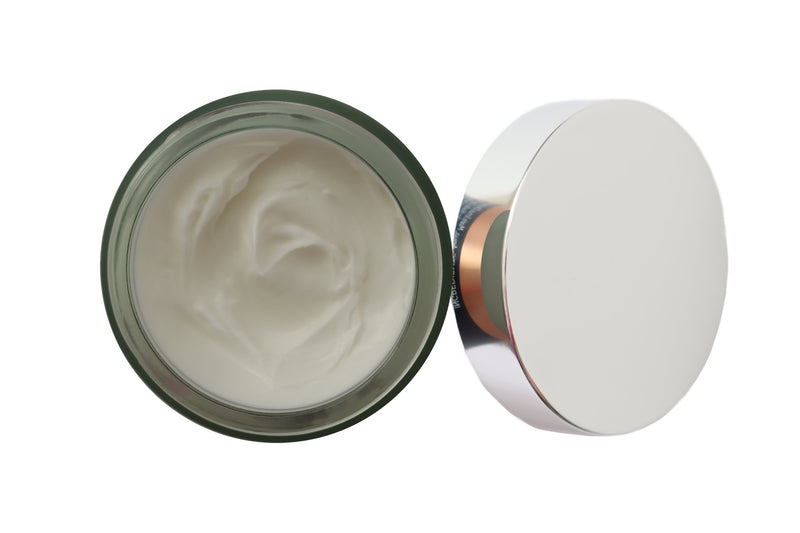 Whipped Shea Butter in open jar birds eye view 